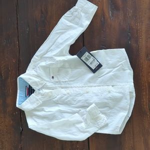 Brand new. White button down shirt
